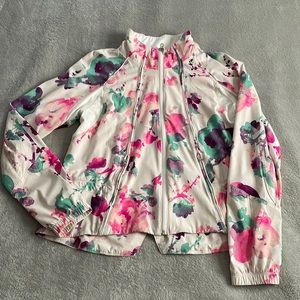 Lightweight Lululemon running jacket. Floral pattern.